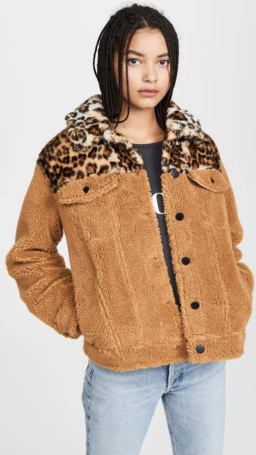 A model wearing a leopard print sherpa jacket from ShopBop.